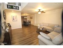 Spacious living room with ample natural light and comfortable seating at 736 E Ivanhoe St, Chandler, AZ 85225