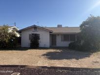 Ranch style home with white brick exterior and mature landscaping at 3209 N 20Th Pl, Phoenix, AZ 85016