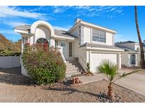 Charming two-story home with a well-manicured yard and a two-car garage at 1179 N Granada Dr, Chandler, AZ 85226