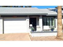 Inviting exterior with a carport and well-maintained landscaping at 7950 E Keats Ave # 138, Mesa, AZ 85209