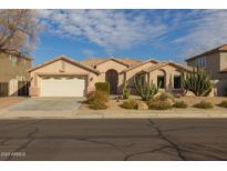 One-story house with desert landscaping and a two-car garage at 3404 E Los Altos Rd, Gilbert, AZ 85297