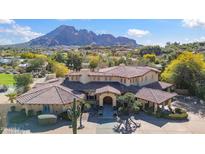 Stunning home with tile roof, mature landscaping and mountain views at 4245 E Claremont Ave, Paradise Valley, AZ 85253