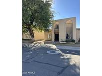 Two-story stucco home with arched entryway and mature tree at 2125 E Dunbar Dr, Tempe, AZ 85282