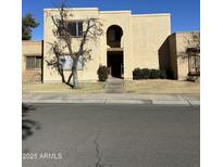 Two-story building exterior with landscaping and parking at 2130 E Dunbar Dr, Tempe, AZ 85282