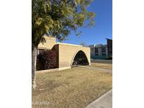 Brick ranch home with arched entryway and landscaped yard at 2146 E Donner Dr, Tempe, AZ 85282