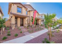 Inviting two-story home with an 'available' sign, showcasing modern design and manicured landscaping at 2828 N Evergreen St, Buckeye, AZ 85396