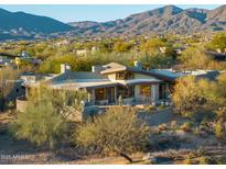 Luxury home with mountain views and desert landscaping at 10531 E Fernwood Ln, Scottsdale, AZ 85262