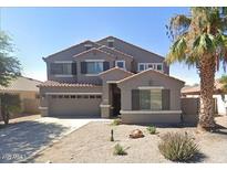 Charming two-story home with a well-manicured desert landscape and a convenient two-car garage at 29050 N Mountain View Rd, San Tan Valley, AZ 85143