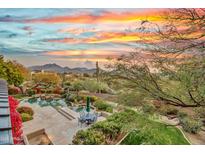 Stunning sunset view overlooking a private pool and patio area, perfect for entertaining at 10040 E Happy Valley Rd # 595, Scottsdale, AZ 85255