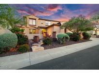 Beautiful two-story home with landscaped front yard and inviting entryway at 13007 W Lowden Rd, Peoria, AZ 85383