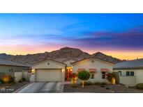 Charming single-Gathering home with a two-car garage and mountain views at 21284 W Hillcrest Blvd, Buckeye, AZ 85396