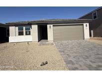 Charming single story home with desert landscaping and a two car garage at 9526 W Luxton Ln, Tolleson, AZ 85353