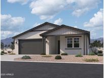 One-story home with gray siding, dark gray garage door, and landscaping at 9534 W Luxton Ln, Tolleson, AZ 85353