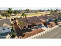 Single story home with tile roof, near golf course at 13917 W Pavillion Dr, Sun City West, AZ 85375