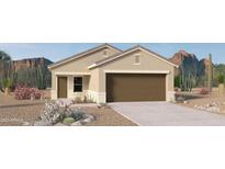 Tan house with brown garage door and desert landscaping at 1775 W Sheridan Ave, Apache Junction, AZ 85120