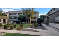 Attractive exterior of a two-story building with landscaping and walkway at 1331 W Baseline Rd # 257, Mesa, AZ 85202