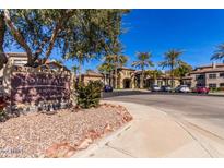 Mountain Canyon Condominium Residences building with parking lot and landscaping at 3236 E Chandler Blvd # 2053, Phoenix, AZ 85048