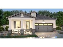Stunning curb appeal! This inviting home features a charming front porch and attached two-car garage at 3742 E Rochelle Cir, Mesa, AZ 85213