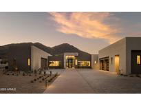Stunning desert home featuring a stone entryway and mountain views at 5327 N Invergordon Rd, Paradise Valley, AZ 85253