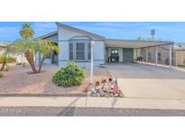 Cute single-wide home with carport and nicely landscaped yard at 8500 E Southern Ave # 577, Mesa, AZ 85209