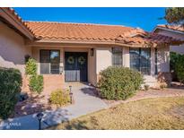 Inviting home exterior with a terracotta roof and landscaped front yard at 1326 E Clearwater Ln, Gilbert, AZ 85234
