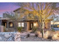 Attractive two-story home with stone accents and landscaping at 17763 N 93Rd Way, Scottsdale, AZ 85255