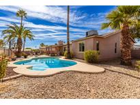 Inviting kidney-shaped pool in a sunny backyard at 14409 N 34Th Way, Phoenix, AZ 85032