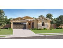 Single-story home with a brown garage door and stone accents at 17593 W Victory St, Goodyear, AZ 85338