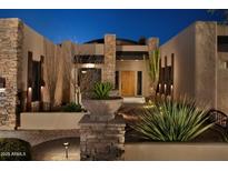 Stunning desert home with stone accents and mature landscaping at 28492 N 95Th Pl, Scottsdale, AZ 85262