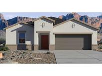 Charming single-story home featuring a two-car garage, neutral paint, and mountain views at 8517 W Mantle Way, Florence, AZ 85132