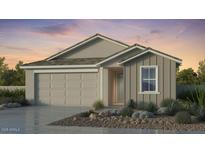 One-story house with beige siding, gray roof, and a two-car garage at 4078 E Ghost Flower Ln, San Tan Valley, AZ 85140