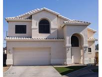 Two-story house with a large garage and well-maintained lawn at 1425 S Lindsay Rd # 20, Mesa, AZ 85204