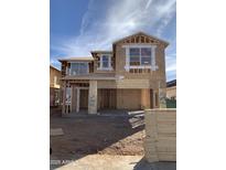 Two-story house under construction with wood framing and windows at 4173 E Kolin Ln, San Tan Valley, AZ 85143