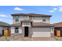 Charming two-story home with a two car garage and stone accents at 9054 S 169Th Dr, Goodyear, AZ 85338