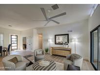 Bright and airy living room features modern decor and lots of natural light at 8708 E San Lucas Dr, Scottsdale, AZ 85258