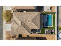 Property features a large backyard with a pool and spacious layout at 38100 W Santa Clara Ave, Maricopa, AZ 85138