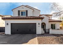 Two-story house with dark brown garage door and light-colored stucco at 3057 E Trigger Way, Gilbert, AZ 85297