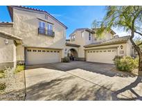 Two-car garage and inviting entryway of this beautiful home at 20802 N Grayhawk Dr # 1175, Scottsdale, AZ 85255