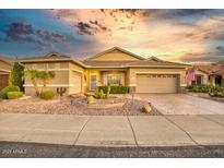 Charming single-story home with desert landscaping and a two-car garage at 17675 N Coconino Dr, Surprise, AZ 85374