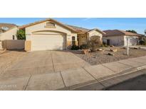 Charming single-story home with a well-maintained front yard and attached two-car garage at 6516 W Matilda Ln, Glendale, AZ 85308