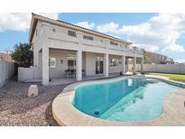 Inviting backyard with a refreshing pool, perfect for relaxation and outdoor gatherings at 7318 W Paso Trl, Peoria, AZ 85383