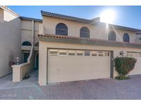 Charming townhome with two-car garage and well-maintained brick driveway at 2142 E Turney Ave # 4, Phoenix, AZ 85016