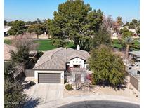 Aerial view of a single-Gathering home showing its desert landscaping and tile roof with golf course view at 800 W Palo Brea Dr, Litchfield Park, AZ 85340