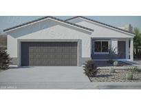 Charming single-story home with a gray garage door, stucco and desert landscaping at 10947 W Malibu Cir, Arizona City, AZ 85123