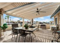 Spacious covered patio with ample seating, perfect for outdoor dining and relaxation at 1056 S 79Th St, Mesa, AZ 85208