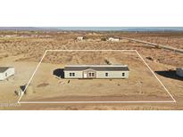 An aerial view shows the placement of the manufactured home and the dimensions of the property at 2723 S 357Th Dr, Tonopah, AZ 85354