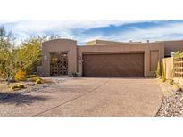 Stunning desert home featuring a two-car garage, private gate, and low-maintenance desert landscaping at 8502 E Cave Creek Rd # 53, Carefree, AZ 85377