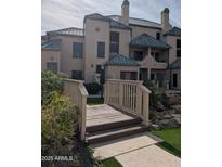 Attractive condominium exterior with charming bridge at 101 N 7Th St # 220, Phoenix, AZ 85034
