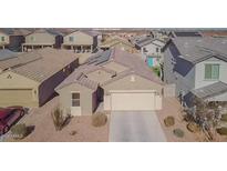 Charming single-story home featuring a two-car garage and low-maintenance landscaping at 21582 W Cocopah St, Buckeye, AZ 85326