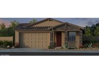 Charming single-story home features a two-car garage and stone accents for added curb appeal at 20221 W Roma Ave, Litchfield Park, AZ 85340